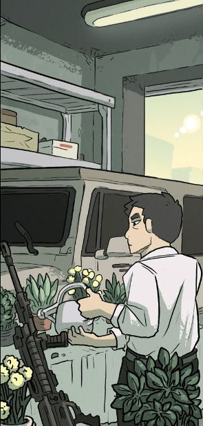 A garage interior. David Shimizu, in a white shirt and black trousers, waters some potted plants that are, along with a large machine gun, resting on the hood of a Humvee.